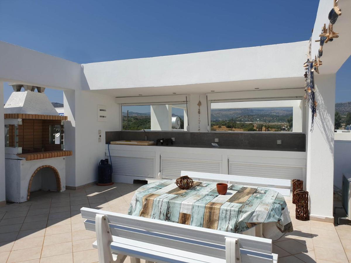 Sea Breeze Villa Haraki Bagian luar foto